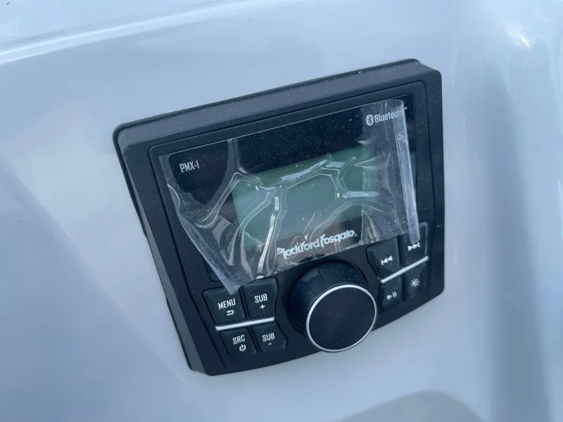 Slide: The Image of 2025 Bentley Pontoons Bolt audio control panel with Bluetooth connectivity. - 13