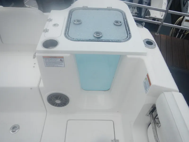 Slide: The Image of 2025 Sea Fox 268 Commander boat interior with livewell and storage compartments. - 19