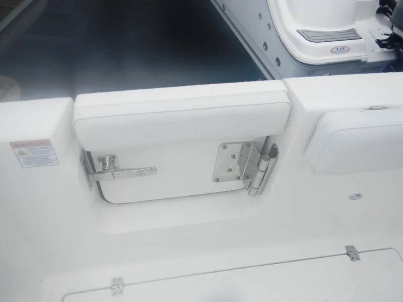 Slide: The Image of 2025 Sea Fox 268 Commander boat interior with white door and latch. - 20
