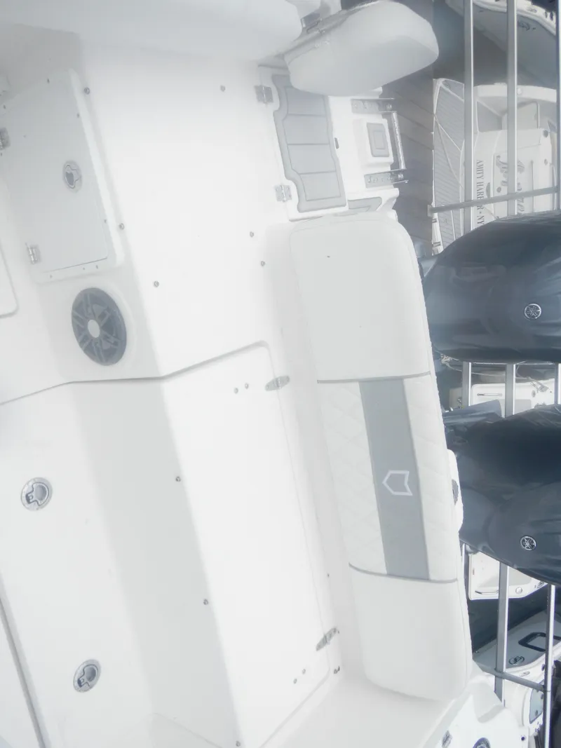 Slide: The Image of 2025 Sea Fox 268 Commander boat deck with dual outboard motors. - 21