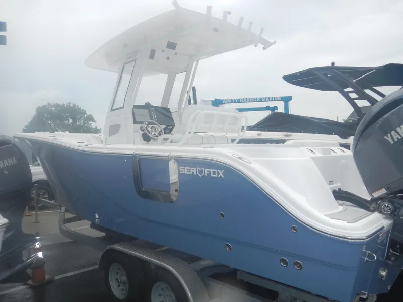 Slide: The Image of 2025 Sea Fox 268 Commander boat on trailer, side view. - 3