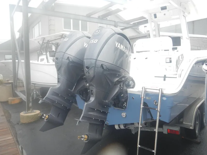 Slide: The Image of 2025 Sea Fox 268 Commander with twin Yamaha 150 outboard engines. - 7