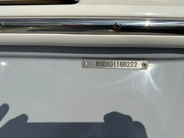Slide: The Image of 2022 Robalo 266 Cayman boat hull identification number (HIN) plate. - 14