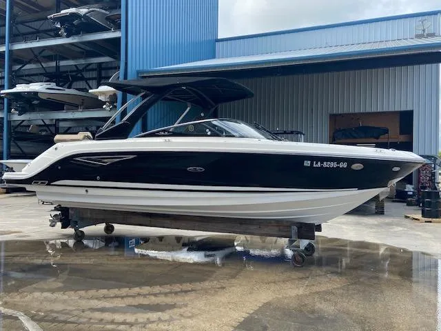 Slide: The Image of 2017 Sea Ray 280 SLX boat in storage facility. - 0