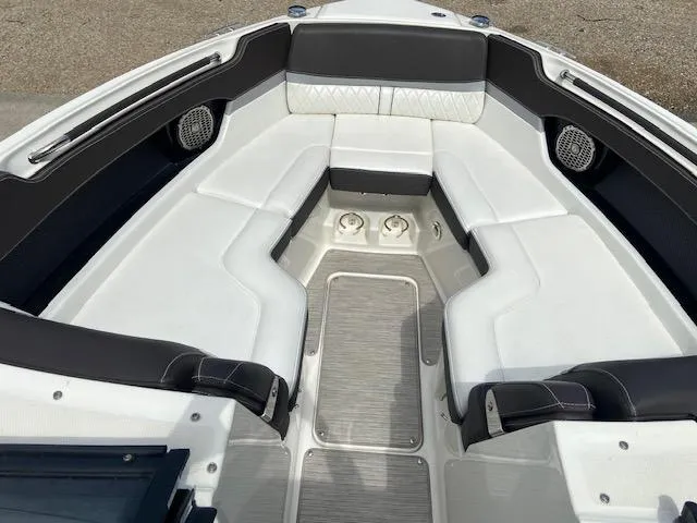 Slide: The Image of 2017 Sea Ray 280 SLX boat interior with white and black seating. - 14