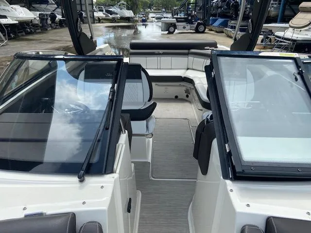 Slide: The Image of 2017 Sea Ray 280 SLX boat interior with seating and windshield. - 16