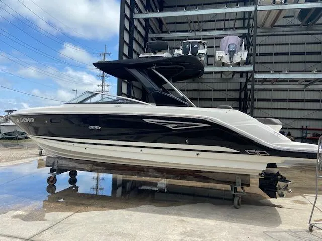 Slide: The Image of 2017 Sea Ray 280 SLX boat in storage facility. - 2