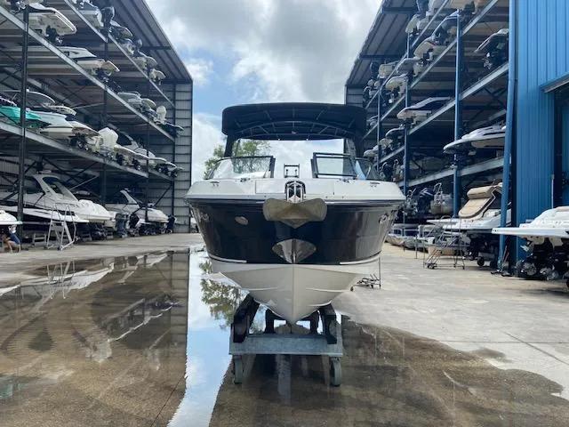 Slide: The Image of 2017 Sea Ray 280 SLX boat in a marina storage facility. - 5