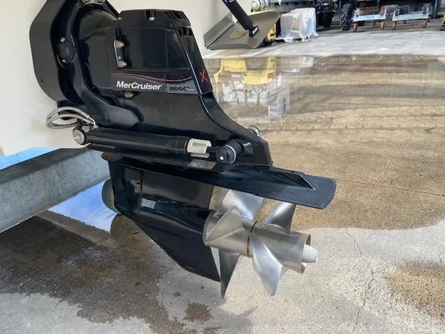 Slide: The Image of Close-up of MerCruiser outdrive on 2017 Sea Ray 280 SLX boat. - 7