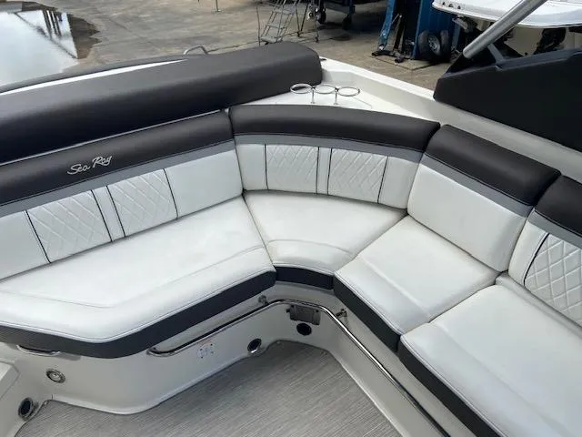 Slide: The Image of 2017 Sea Ray 280 SLX boat with luxurious white and black seating. - 8