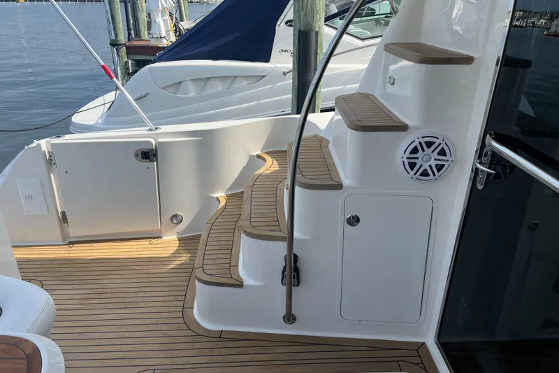 Slide: The Image of 2007 Sea Ray 52 Sedan Bridge yacht with teak steps and deck. - 27