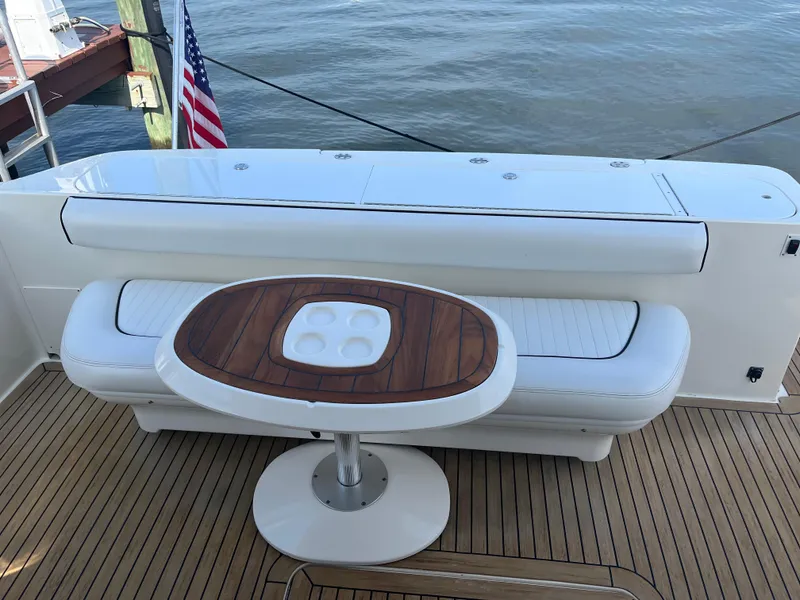 Slide: The Image of Outdoor seating area on a 2007 Sea Ray 52 Sedan Bridge yacht. - 30