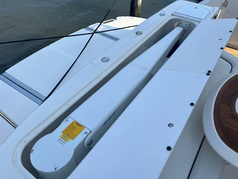 Slide: The Image of 2007 Sea Ray 52 Sedan Bridge swim platform with storage compartment. - 35