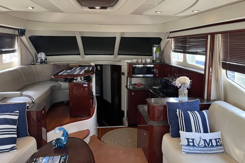 Slide: The Image of Luxurious interior of a 2007 Sea Ray 52 Sedan Bridge yacht with modern amenities. - 43