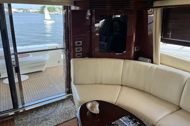 Slide: The Image of Interior of 2007 Sea Ray 52 Sedan Bridge yacht with waterfront view. - 45