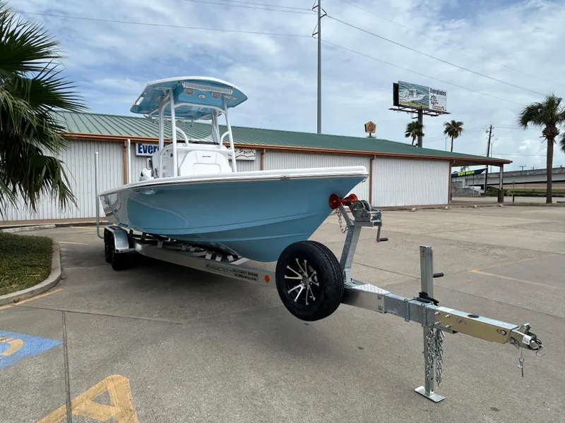 Slide: The Image of 2024 Sea Pro 250 DLX boat on trailer in parking lot. - 4