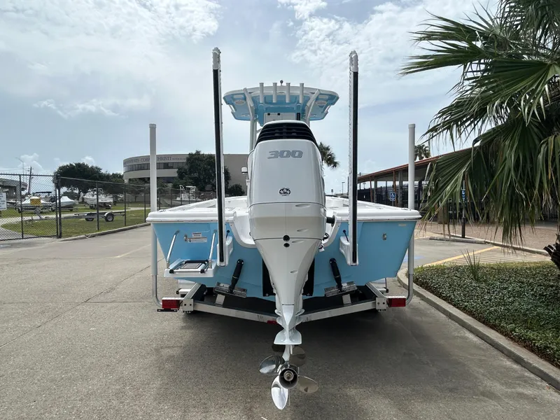 Slide: The Image of 2024 Sea Pro 250 DLX boat with 300 HP engine, rear view. - 7