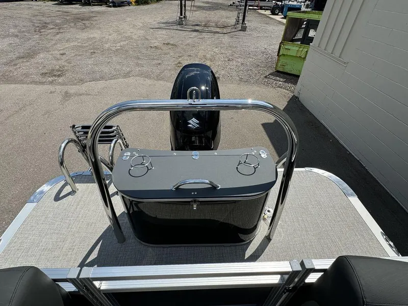 Slide: The Image of 2025 Tahoe LTZ 2385 QL pontoon boat rear view with outboard motor. - 15