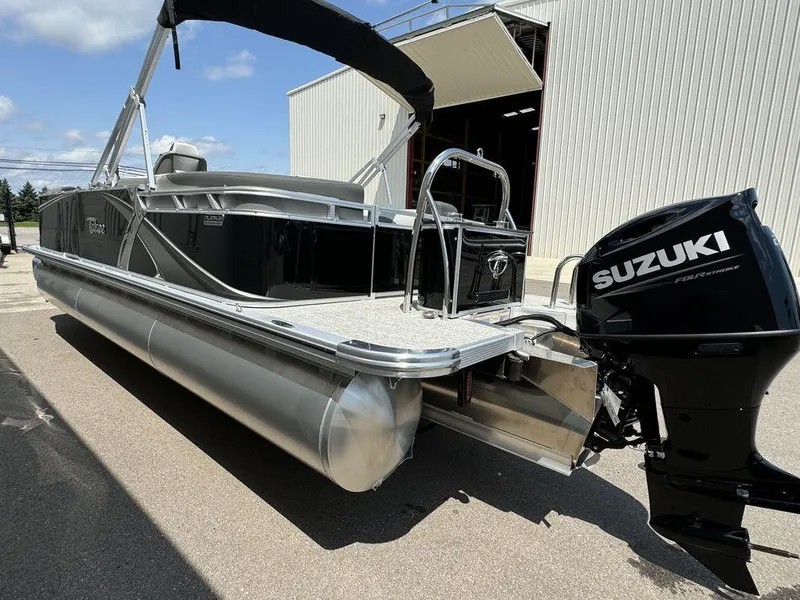 Slide: The Image of 2025 Tahoe LTZ 2385 QL pontoon boat with Suzuki four-stroke outboard motor. - 16