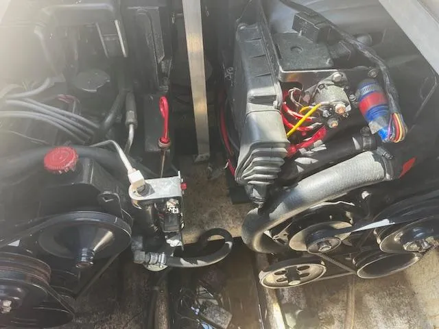 Slide: The Image of Engine compartment of a 1995 Monterey 296 Cruiser boat. - 18