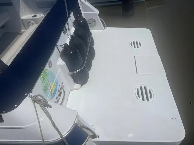 Slide: The Image of 1995 Monterey 296 Cruiser boat stern with fenders and swim platform. - 3