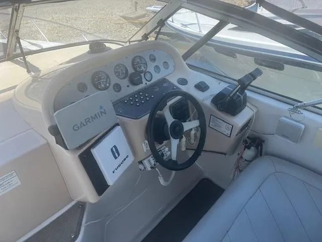 Slide: The Image of 1995 Monterey 296 Cruiser helm with Garmin navigation system and Furuno equipment. - 4