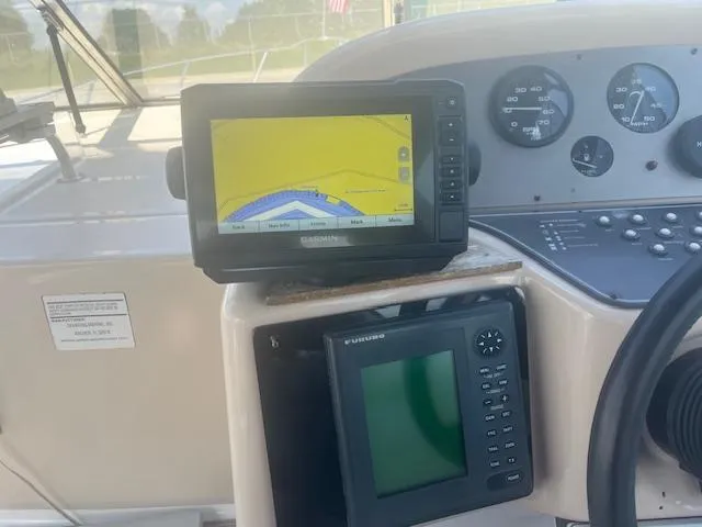 Slide: The Image of Dashboard of a 1995 Monterey 296 Cruiser with Garmin navigation system. - 5