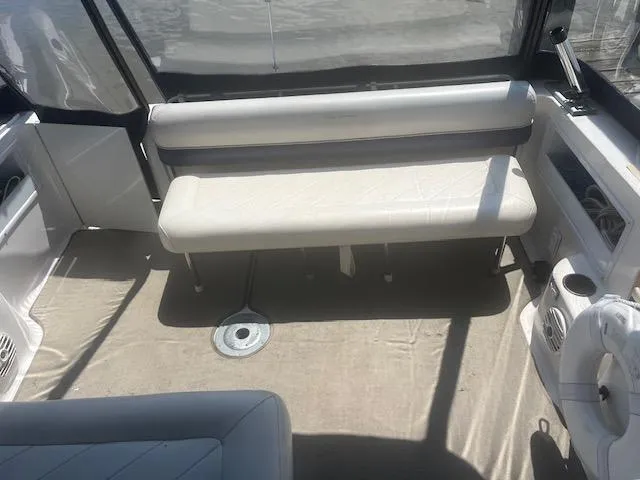 Slide: The Image of Interior seating area of a 1995 Monterey 296 Cruiser boat. - 8