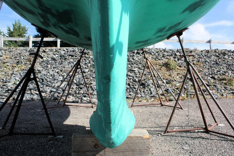 Slide: The Image of 1988 Tartan 34-2 Scheel Keel sailboat on stands, viewed from below. - 14