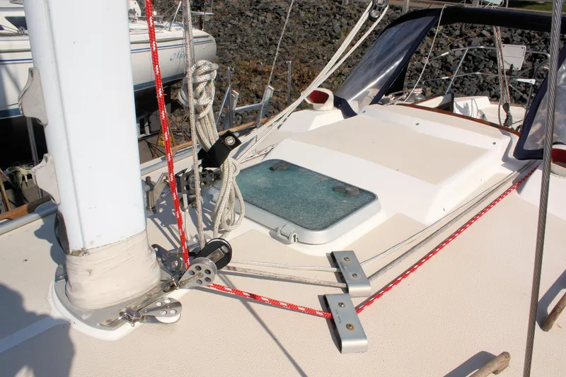 Slide: The Image of 1988 Tartan 34-2 Scheel Keel sailboat deck with rigging and hatch. - 9