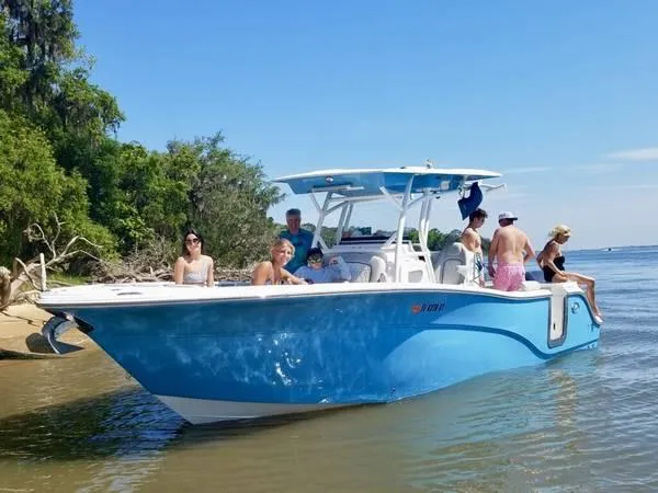The Image of 2021 Sea Fox 288 Commander boat with people enjoying a sunny day on the water. - 0