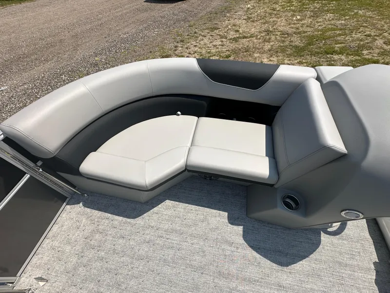 Slide: The Image of 2025 South Bay 220RSLE boat with gray and black seating area. - 8