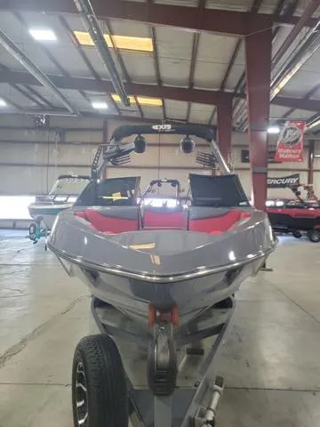 Slide: The Image of 2022 Axis Wake Research T23 boat in showroom, front view. - 11