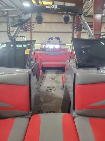 Slide: The Image of 2022 Axis Wake Research T23 boat interior with red and gray seating. - 9