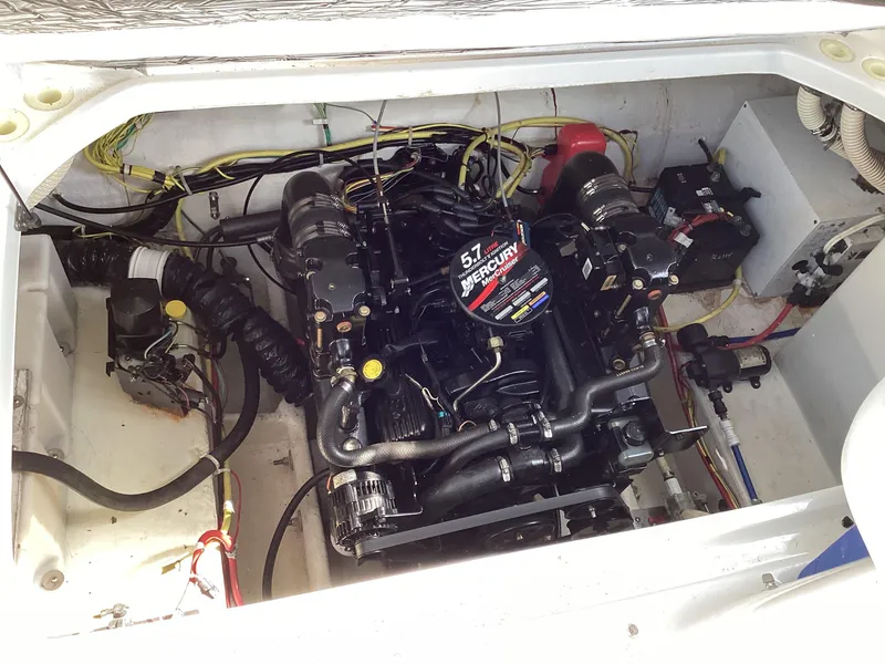 Slide: The Image of 2004 Bayliner 2655 Ciera engine compartment with 5.7L MerCruiser engine. - 14