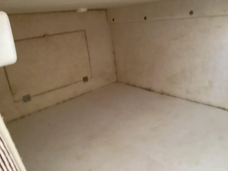 Slide: The Image of Empty interior cabin of a 2004 Bayliner 2655 Ciera boat. - 26