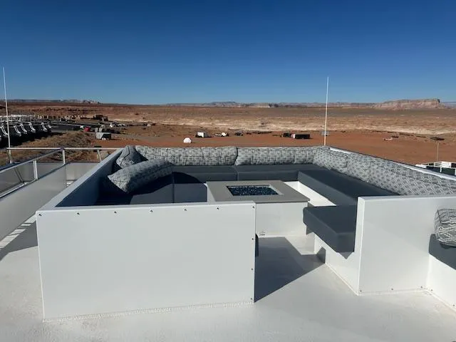 Slide: The Image of Rooftop lounge on Adonia Ovation Shared Ownership Trip 5, 2023, with desert landscape view. - 13