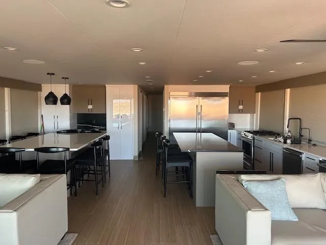 Slide: The Image of Luxurious modern kitchen and dining area in Adonia Ovation Shared Ownership Trip 5, 2023 model. - 7