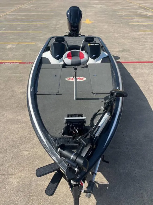 Slide: The Image of 2016 Skeeter ZX 250 fishing boat in a parking lot. - 10