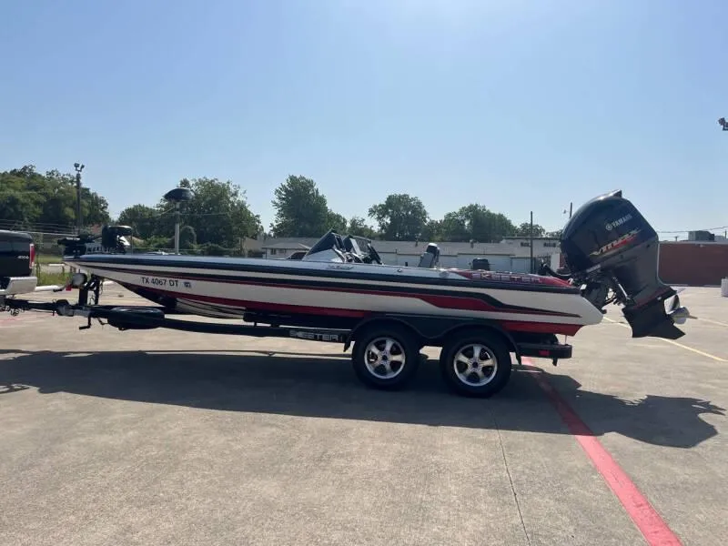 Slide: The Image of 2016 Skeeter ZX 250 boat on trailer in parking lot. - 14