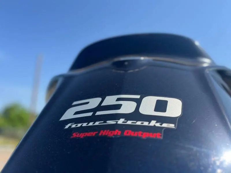 Slide: The Image of Close-up of 2016 Skeeter ZX 250 four-stroke engine with Super High Output text. - 16