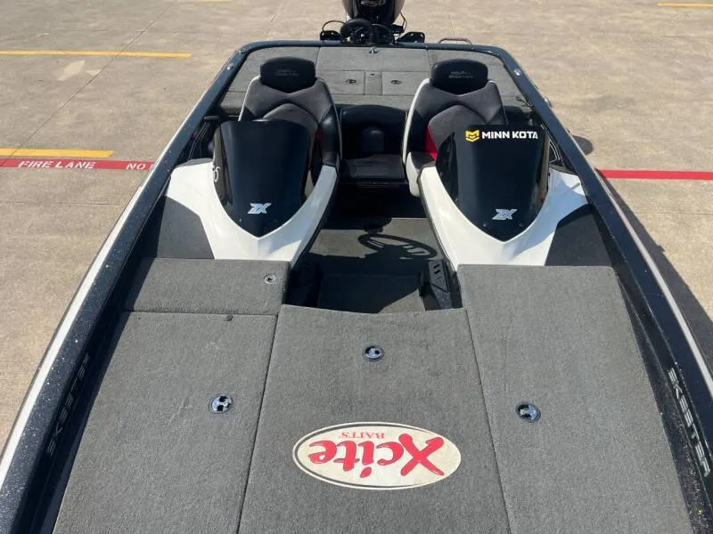 Slide: The Image of 2016 Skeeter ZX 250 bass boat with Minn Kota trolling motor. - 19