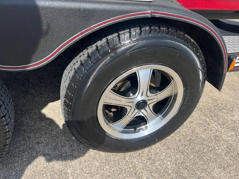 Slide: The Image of Close-up of a 2016 Skeeter ZX 250 boat trailer wheel. - 49