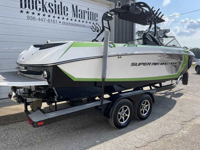 Slide: The Image of 2016 Nautique G25 boat on trailer at Dockside Marine. - 2