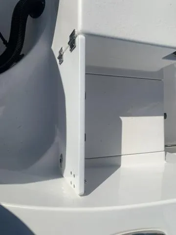Slide: The Image of 2024 Sea Pro 262 CC boat interior detail with storage compartment. - 19