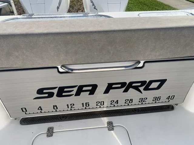 Slide: The Image of 2024 Sea Pro 262 CC boat with built-in measuring scale on deck. - 24