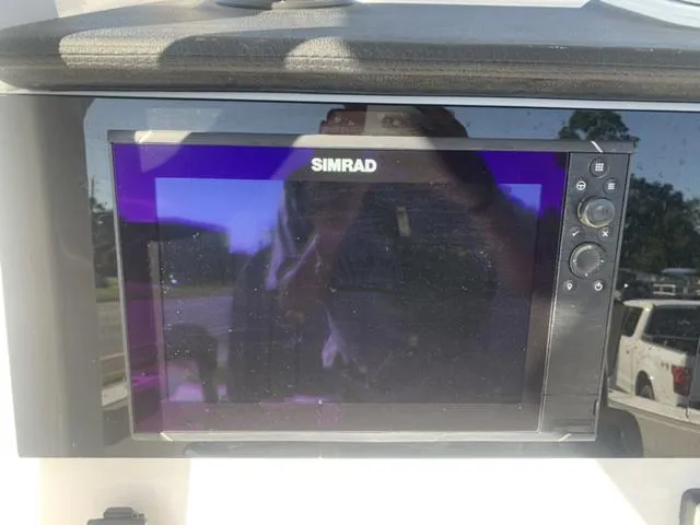 Slide: The Image of Simrad display on 2024 Sea Pro 262 CC boat dashboard. - 34