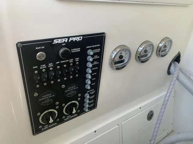 Slide: The Image of Control panel of 2024 Sea Pro 262 CC boat with gauges and switches. - 47