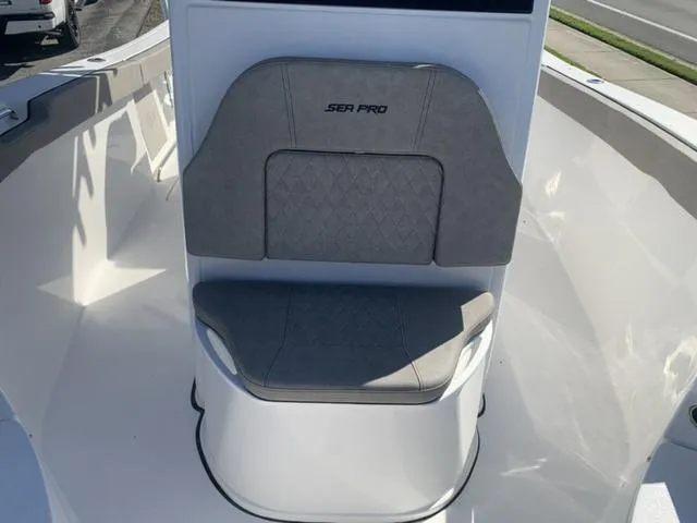 Slide: The Image of 2024 Sea Pro 262 CC boat seat with gray upholstery. - 49