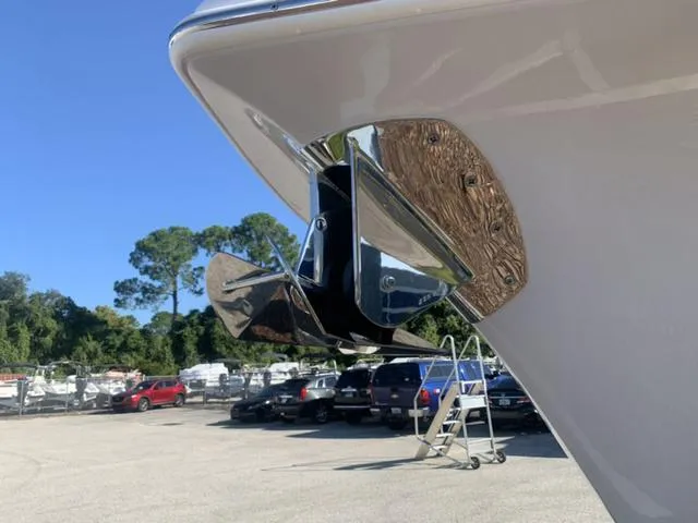 Slide: The Image of 2024 Sea Pro 262 CC boat anchor detail in a marina setting. - 9